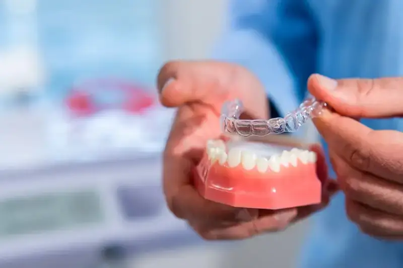 Czy leczenie Invisalign boli?